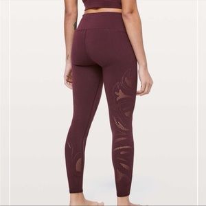 Dark Eggplant Lululemon leggings. Cutout with floral design.